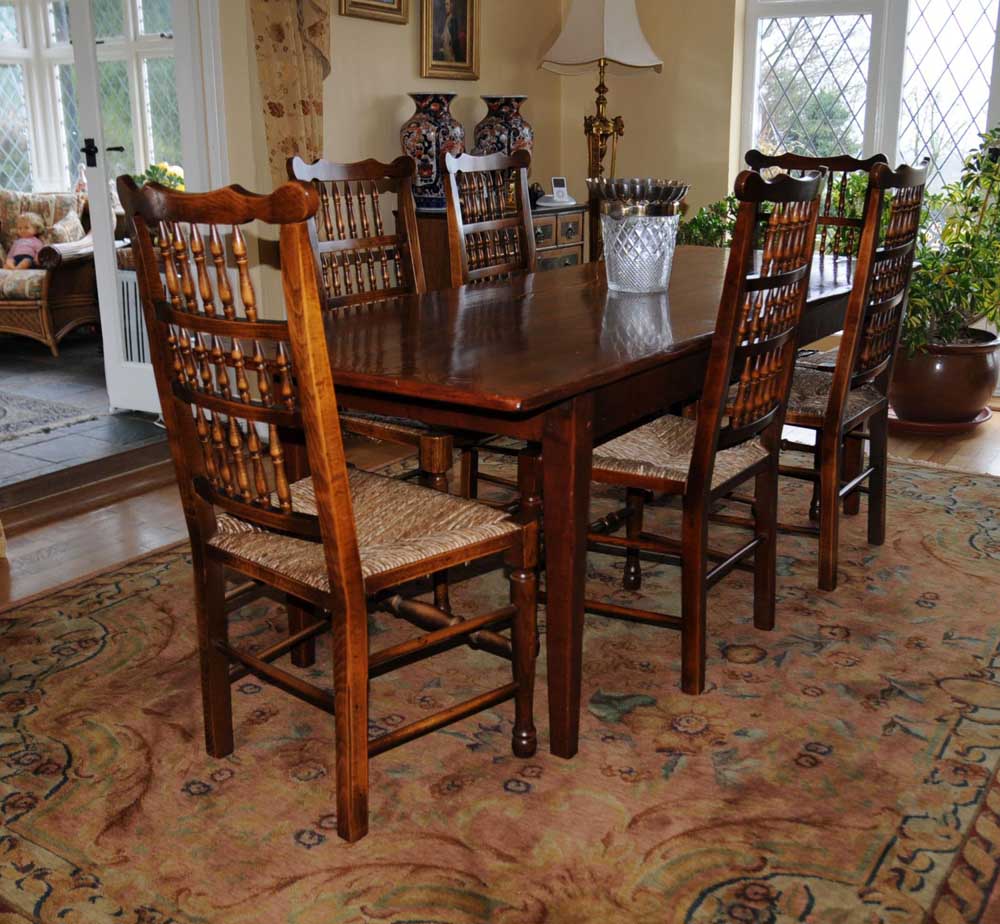Farmhouse dining set with matching set of oak spindleback chairs