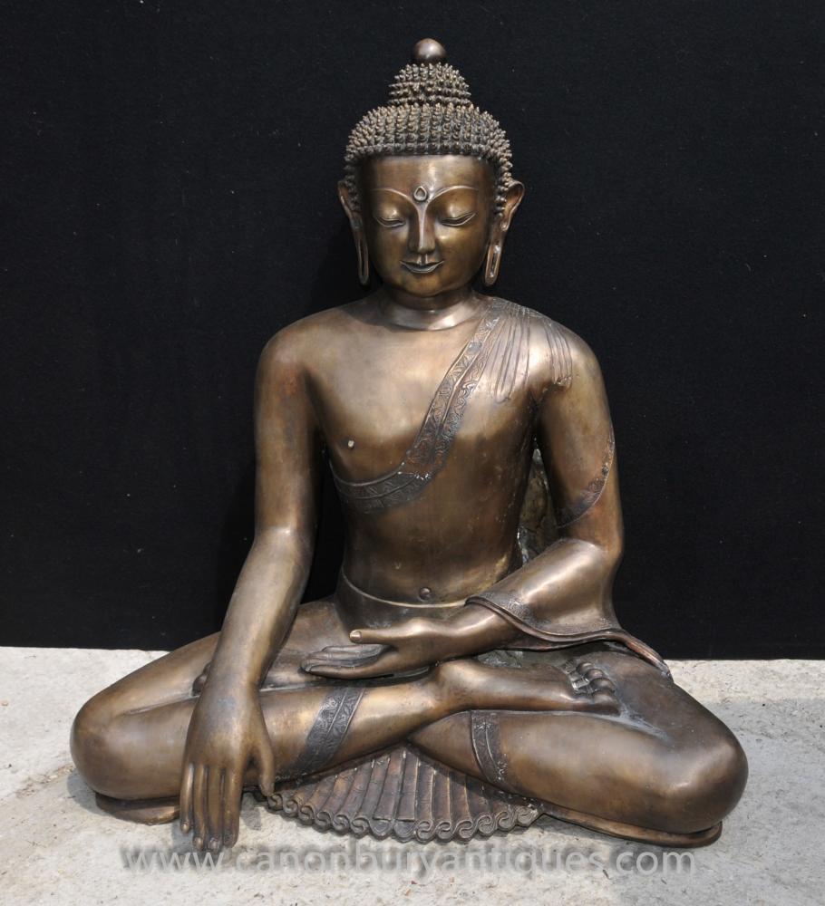 A whole range of bronze Buddhas - from Nepal, Myanmar (Burma), Thailand and China)
