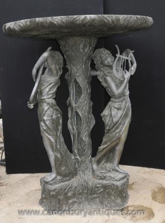 Bronze fountain with classical maidens