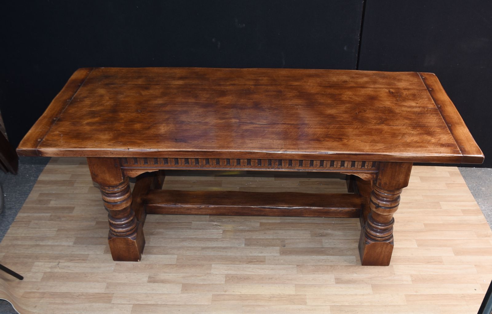 Classic oak refectory table with hand carved apron with gothic arch motifs
