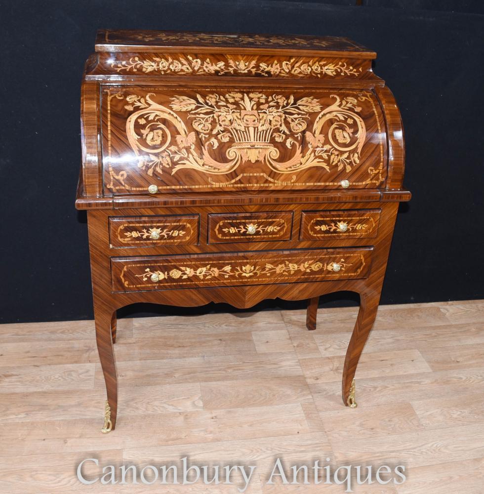 Intricate inlay work on this roll top desk
