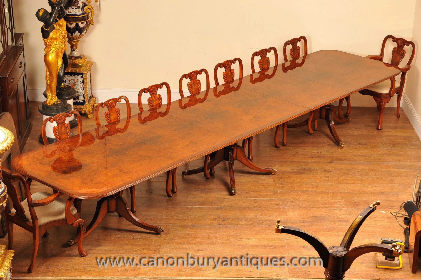 Regency table with Chippendale chairs in walnut