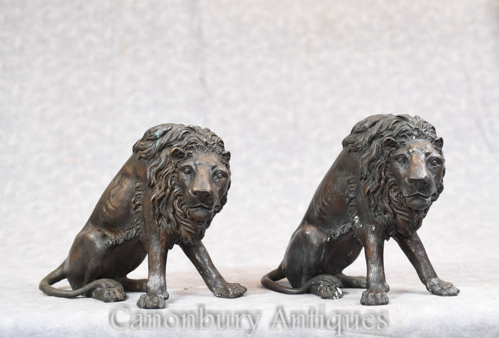 Bronze lions in the manner of Landseer
