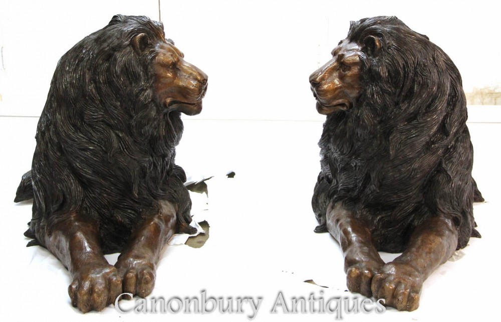 pair bronze recumbent lions 