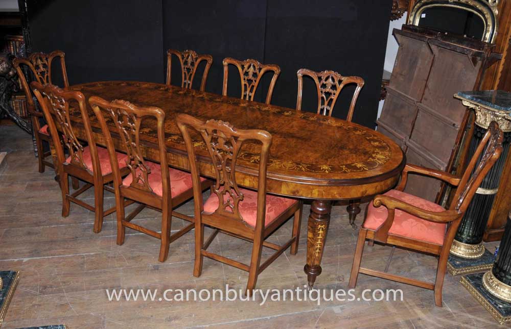 Walnut Victorian dining table with set of matching Chippendales 