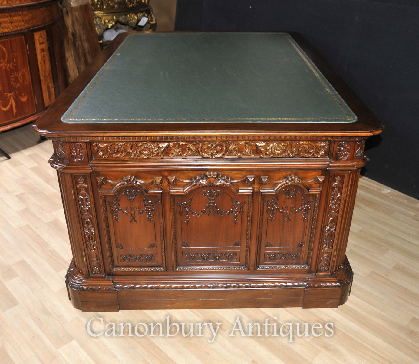 Side shot of the desk, note intricate and ornate carving