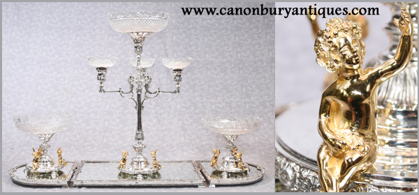 This silver plate centrepiece is adorned with cherubs